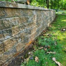 Top-of-The-Line-Paver-Cleaning-and-Moss-Removal-on-Retaining-Wall-in-Lake-Mohawk-NJ 1